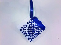 a fourteen by fourteen blue and white woven paper heart